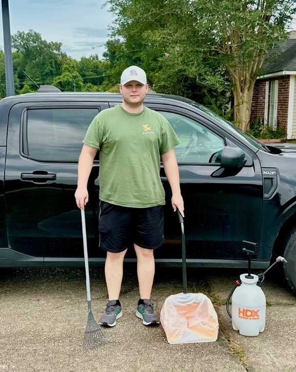 A PooTroop technician ready for a service visit